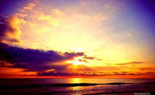 Scenic view of sea against dramatic sky