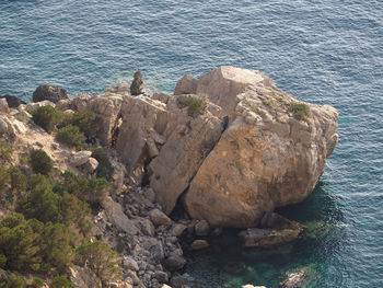 Rocks in calm blue sea