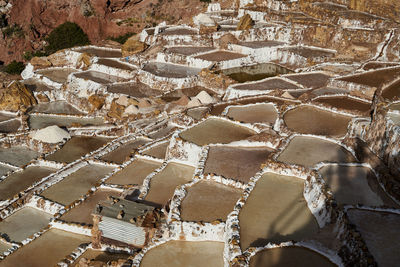 Salt ponds of maras in sacred valley of the incas, near cuzco. basins for salt production