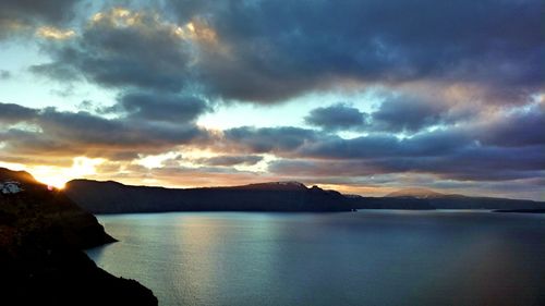 Scenic view of sea against dramatic sky