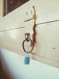 Close-up of padlock on door