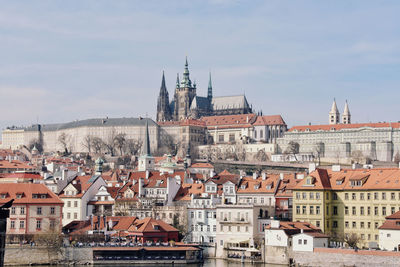 Buildings in city against sky