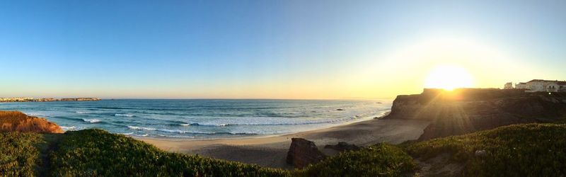 Scenic view of sea at sunset