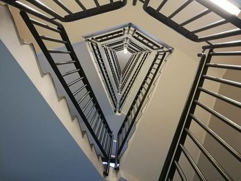 Low angle view of illuminated staircase against sky