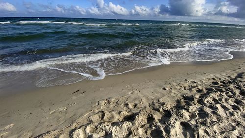 Scenic view of beach against sky