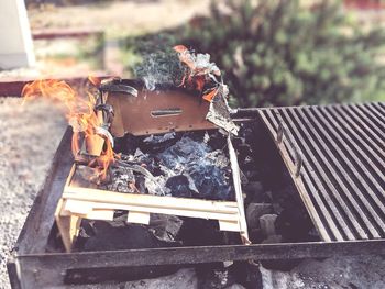 High angle view of fire on barbecue