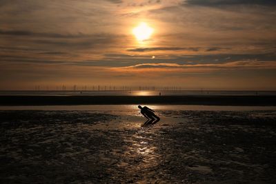 Scenic view of sea during sunset