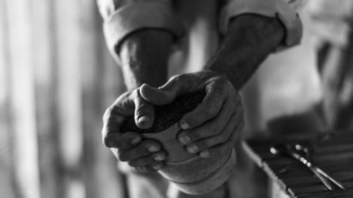 Close-up of hand holding hands