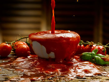 Close-up of fruits in plate on table