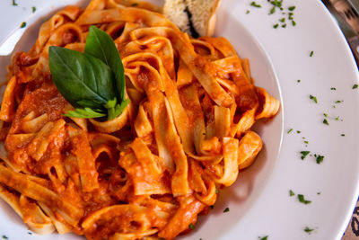 Close-up of red sauce pasta food served in plate