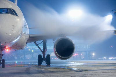 Airplane flying against sky