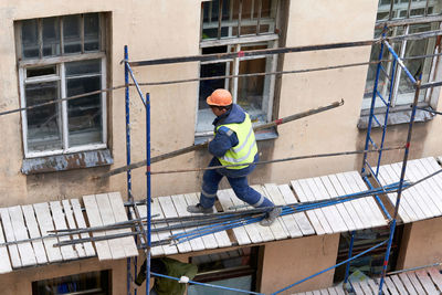 Man working at construction site in building