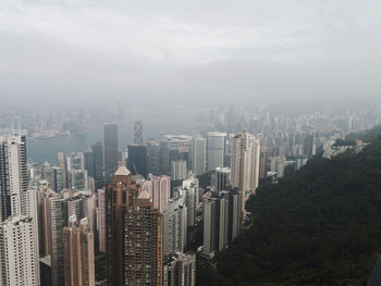 High angle view of cityscape against sky during foggy weather