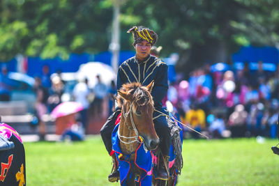 Portrait of people on field