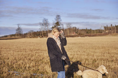 Woman walking with dog