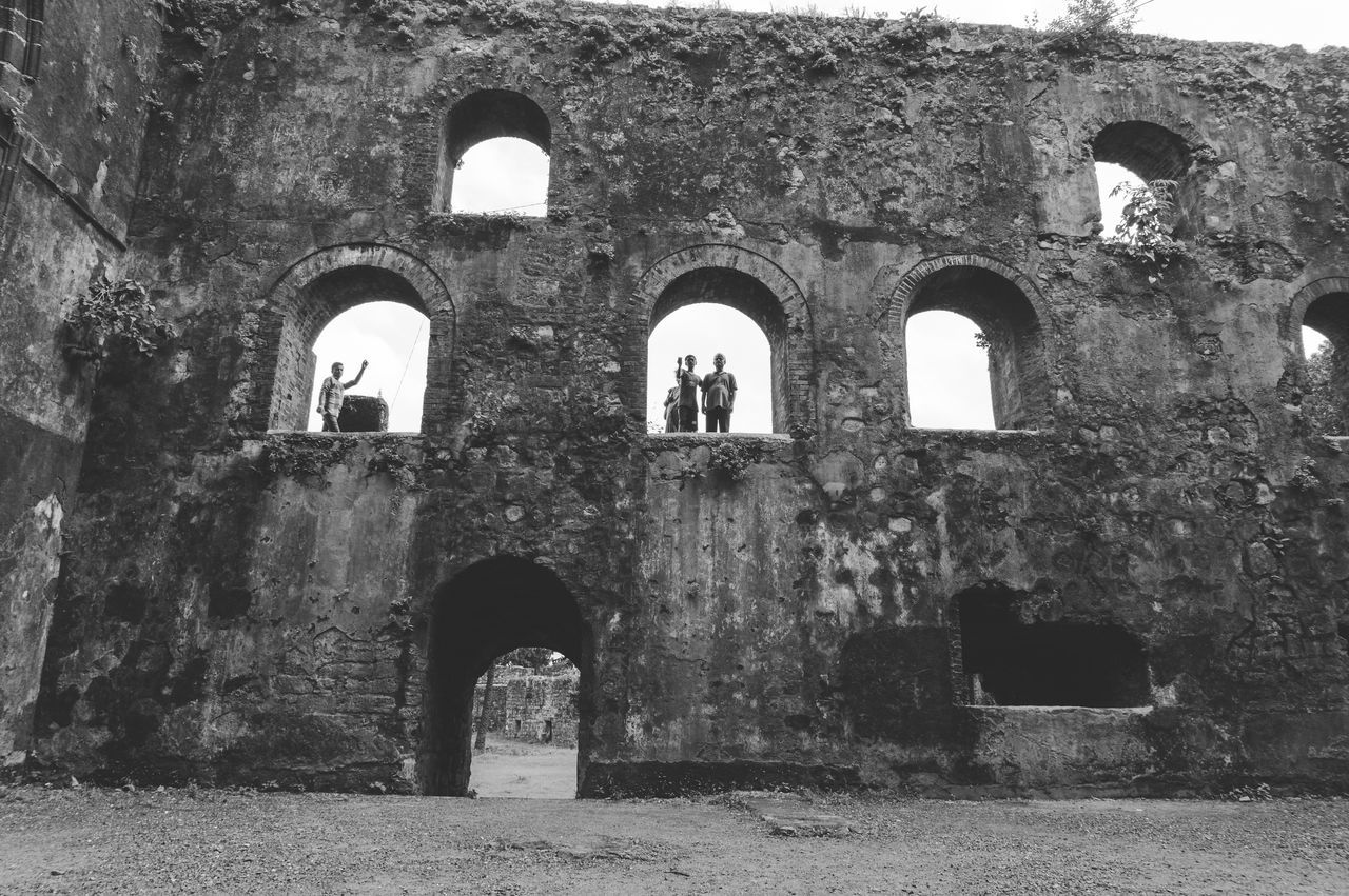 LOW ANGLE VIEW OF ABANDONED BUILDING