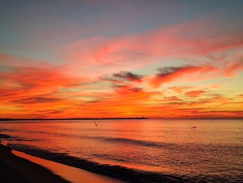 View of calm sea at sunset