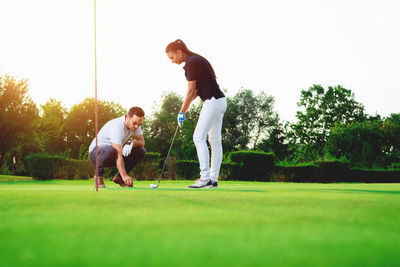 Full length of man on golf course