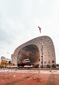 View of building against cloudy sky