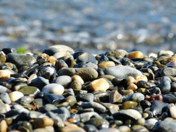 Close-up of stones on beach