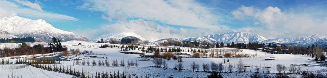 Scenic view of snow covered mountains