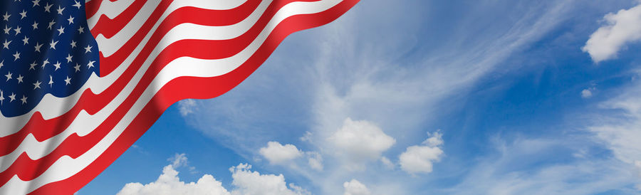 Low angle view of flag against sky