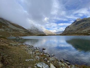 Scenic view of lake and snowcapped mountains against sky julierpass 