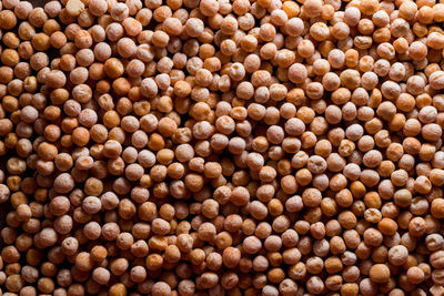 Chickpea background. dry chickpeas. a large number of legumes