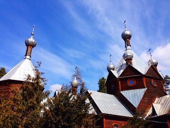 Rustic church against blue sky