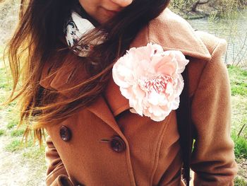 Close-up of hand holding flower