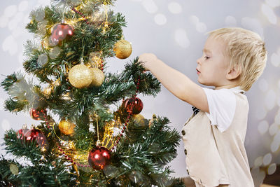 Boy with christmas tree