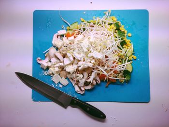 High angle view of chopped vegetables on table