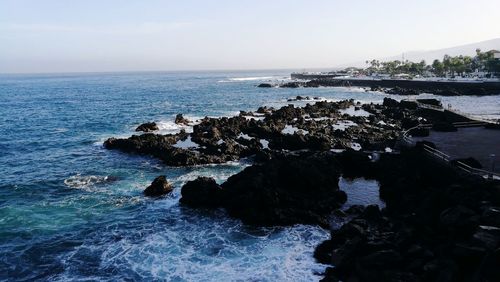 Scenic view of sea against clear sky