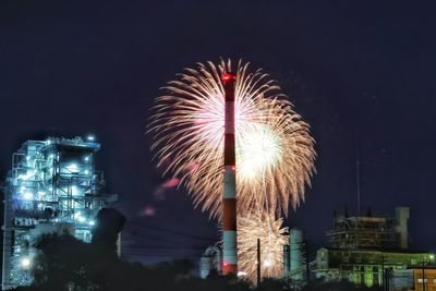 Firework display at night