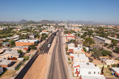 Broadway boulevard leading to tucson skyline, aerial view.