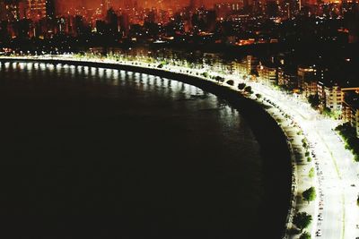 Bridge over river at night