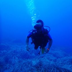 Man swimming in sea