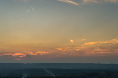 Scenic view of silhouette landscape against sky during sunset