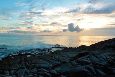Scenic view of sea against sky during sunset