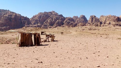 Scenic view of desert against clear sky