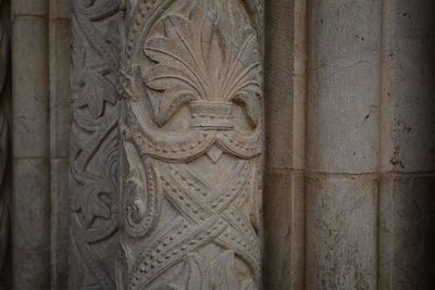 Close-up of cross in temple