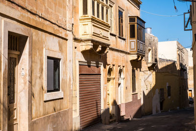 Low angle view of buildings against sky