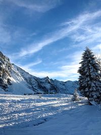 Snow covered mountains against sky