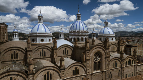 View of buildings in city against sky