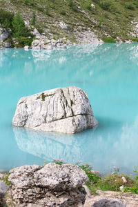 Rock formation in lake sorapiss in the dolomites