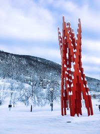 Scenic view of snow covered landscape against sky