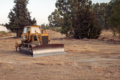 Work bulldozer on the construction of a highway