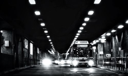 Illuminated walkway at night