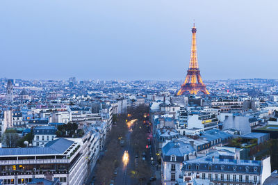 High angle view of city buildings against clear sky