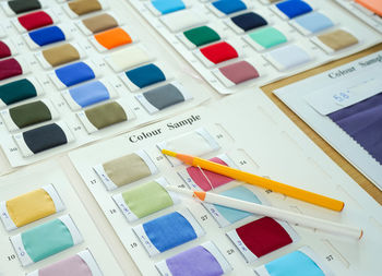 High angle view of multi colored pencils on table